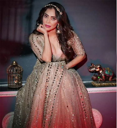 Nikita Rawal Stuns in a Golden Shimmer Look, Says “I feel all shimmery”